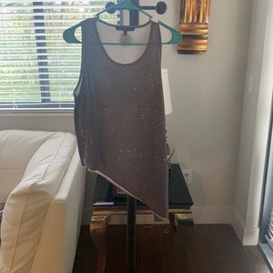 A purple glitter shirt, size medium in women's